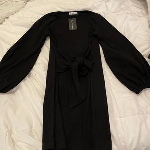 Cute black dress with puff sleeves!